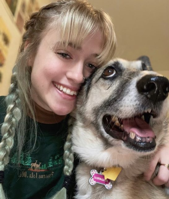 Adopter selfie with a happy husky