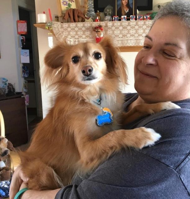 Adopter with her Pomeranian mix