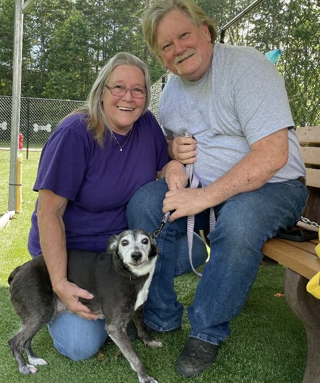 Betty and John Baker with one of their senior rescue dogs